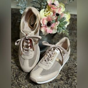 NEW Michael Kors sneakers. Size 9.5. Blush pink with rose gold accent-no box